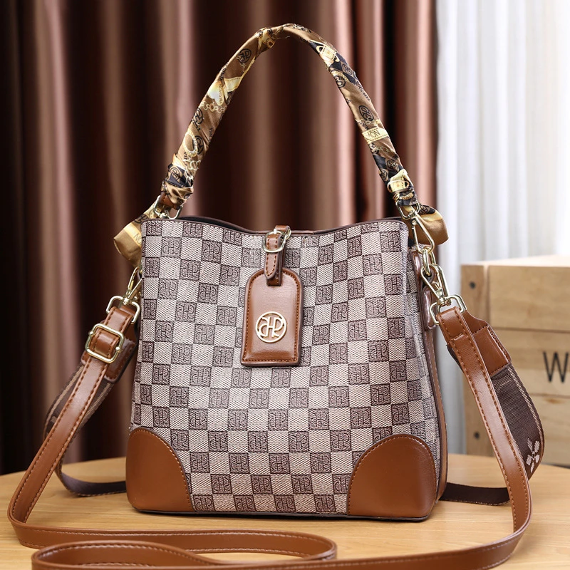 宽肩带包包女2025新款水桶包时尚高级质感斜挎包女士手提单肩小包