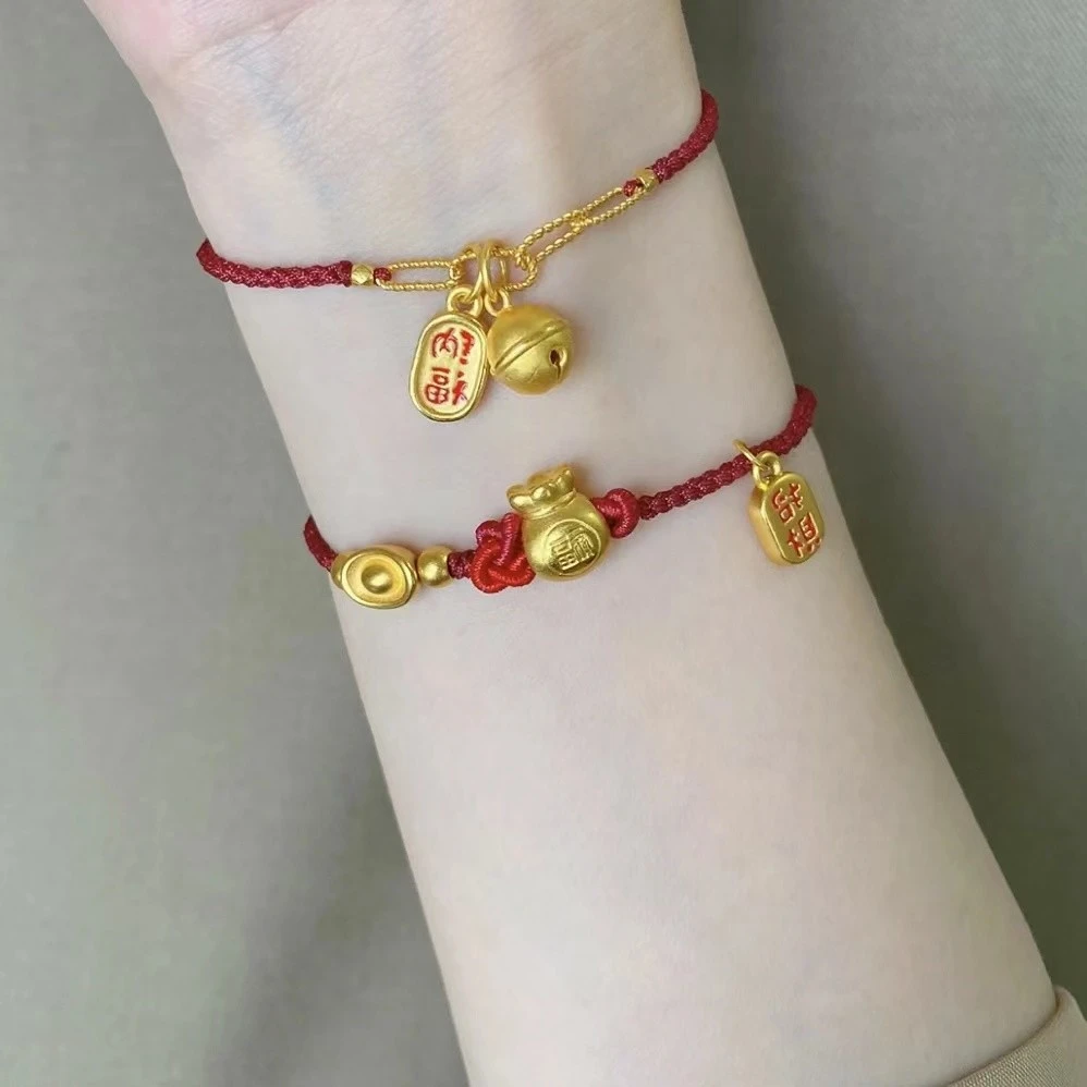 铜合金手链 轻奢金色纳福福袋手链女时尚编织铃铛红绳夏季情侣款