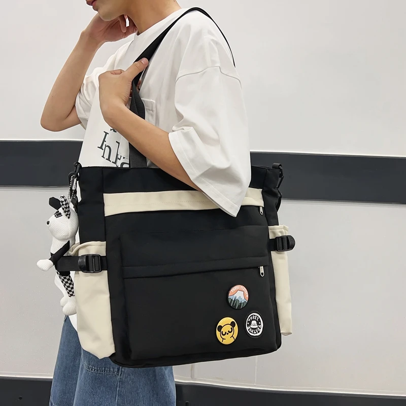 日系斜挎包男潮牌大容量简约单肩包女背包2024新款百搭挎包休闲包