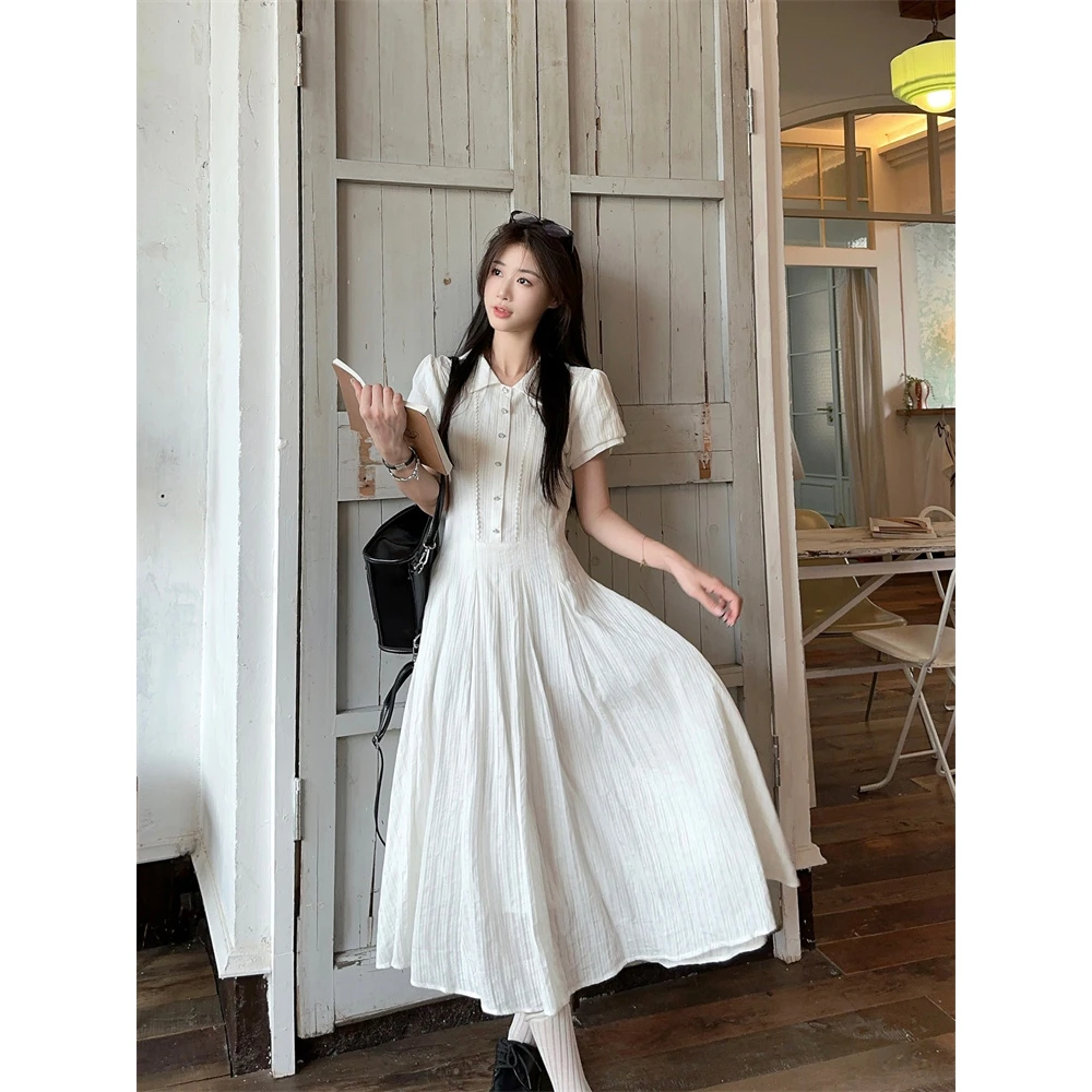 气质服装白色纯欲收腰连衣裙女夏季小众气质显瘦A字裙大裙摆长裙