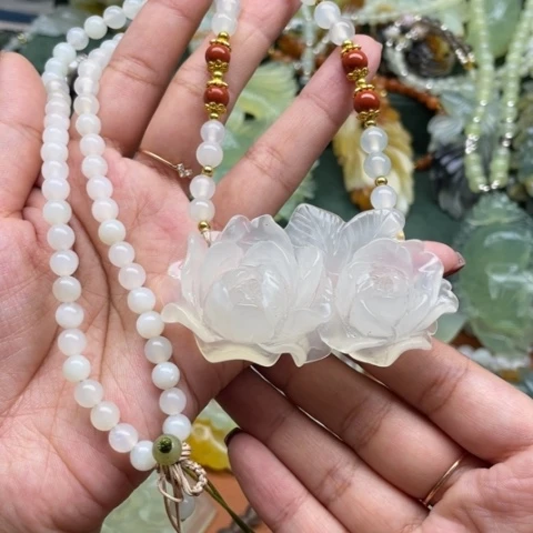 蛇纹石玉吊坠合金倪**舍