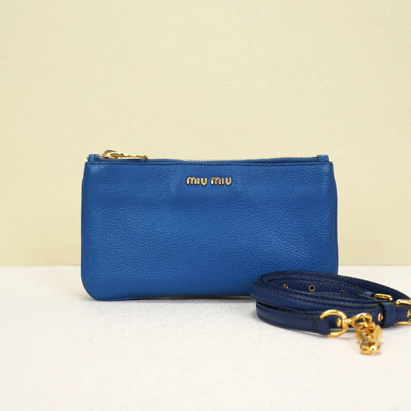 95新 MIU MIU/缪缪 蓝色山羊皮mini斜挎包