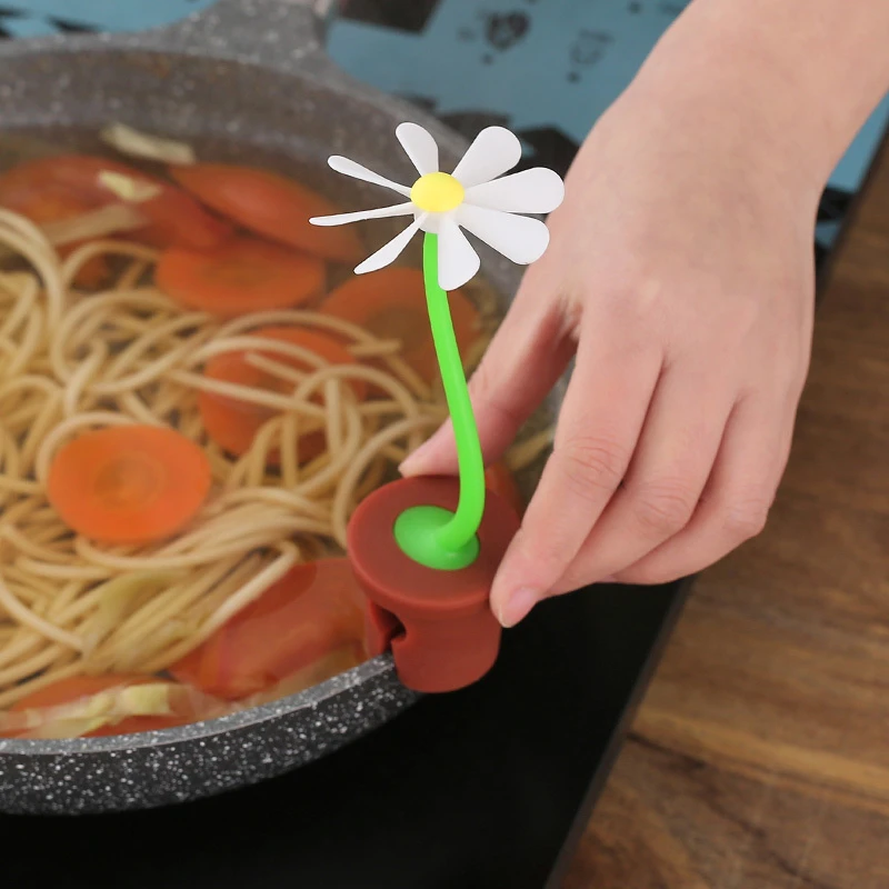 旋转小花防溢锅盖抬高垫可爱雏菊造型奶锅小工具煮粥煲汤散热神器