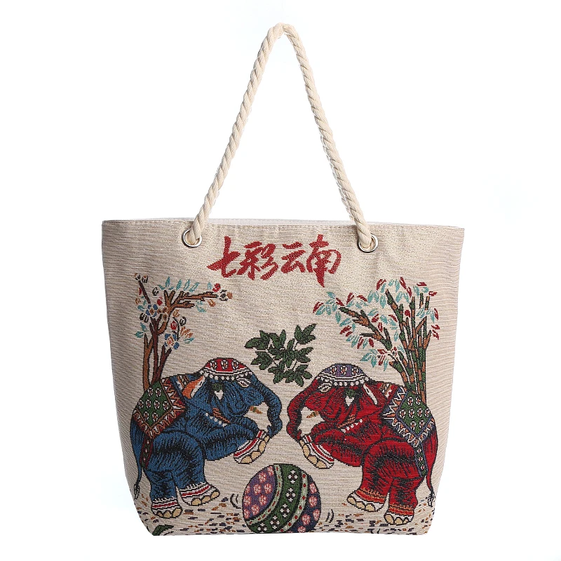 云南昆明西双版纳旅游纪念品双面加金丝绣花大象孔雀图案女手提包