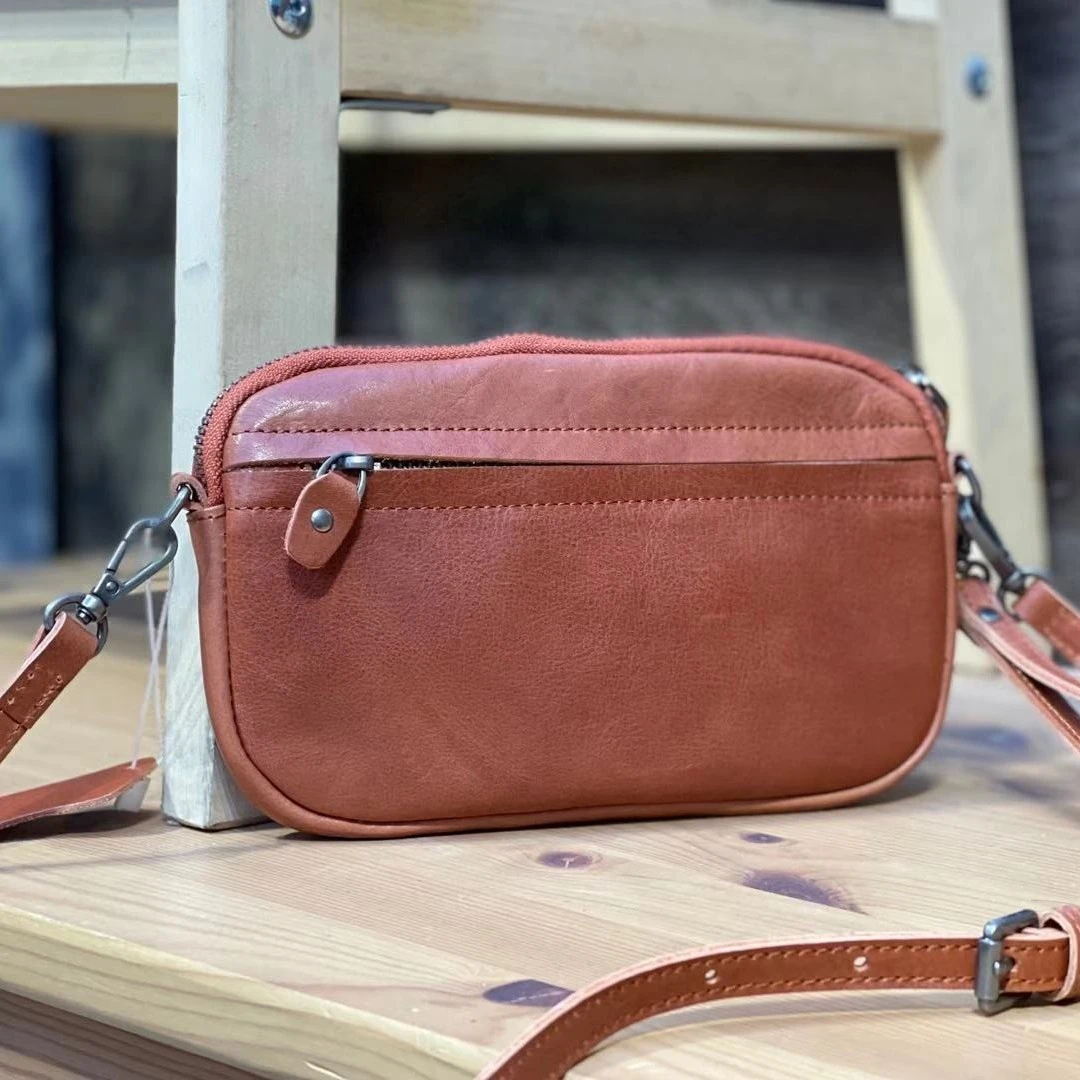 西部印像头层牛皮-手拿包---21018