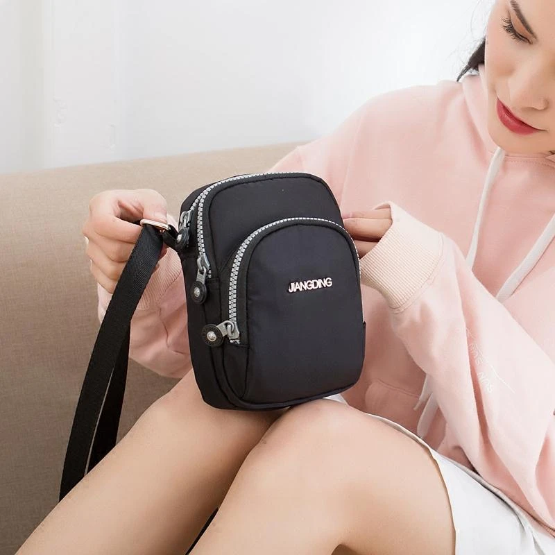 新款韩版休闲大屏手机包单肩包女牛津斜跨布包竖款迷你手机袋小包