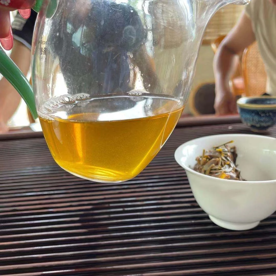23年易武弯弓大树挑采普洱生茶100g