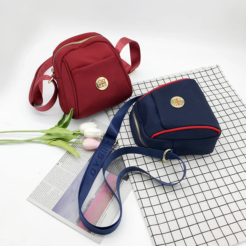 （1845）小帆布斜挎包贝壳单肩女新潮撞色牛津布迷你百搭轻便布包
