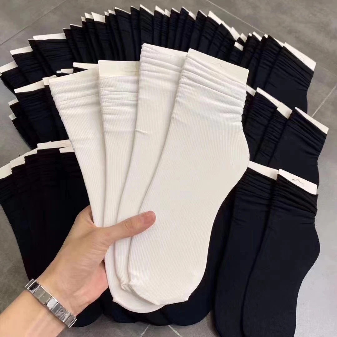 太林服饰 天鹅绒弹力中筒可长可短袜999