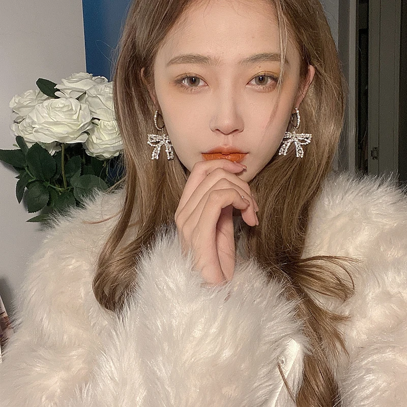 oushipei/欧诗佩 铜合金仿珍珠耳饰 日韩气质轻奢满钻蝴蝶结耳环